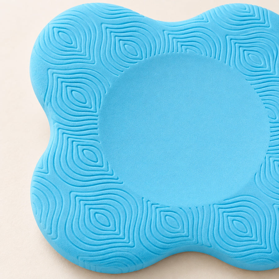 Textured surface of the yoga knee pad